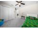 Bedroom with a large closet, window, and grey carpet at 13479 Sw 100Th Ln, Dunnellon, FL 34432