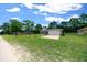 A charming single Gathering home with a spacious front lawn and a convenient two car garage at 13479 Sw 100Th Ln, Dunnellon, FL 34432