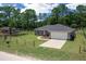 Charming single-story home with a well-manicured lawn, fenced yard, and a two-car attached garage at 13479 Sw 100Th Ln, Dunnellon, FL 34432