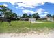 A charming single Gathering home with a spacious front lawn and a convenient two car garage at 13479 Sw 100Th Ln, Dunnellon, FL 34432