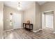 Bright foyer with beautiful wood floors, neutral walls, and a convenient coat closet at 13835 Se 85Th Cir, Summerfield, FL 34491