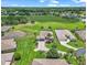 Aerial view of the beautiful home showcasing the well-manicured lawn at 1443 Sw 161St St, Ocala, FL 34473
