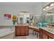 Bathroom featuring a bath tub, vanity, and glass shower at 1443 Sw 161St St, Ocala, FL 34473