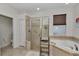 Bathroom with walk-in shower and garden tub at 1443 Sw 161St St, Ocala, FL 34473