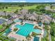 Aerial view of the community pool with ample seating, fountain and manicured grounds at 1443 Sw 161St St, Ocala, FL 34473