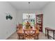 Formal dining room bathed in natural light, perfect for Gathering gatherings or dinner parties at 1443 Sw 161St St, Ocala, FL 34473