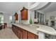 Open-concept kitchen with an expansive countertop, seamlessly connected to the living room at 1443 Sw 161St St, Ocala, FL 34473