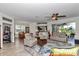 Bright living room with modern furniture and access to the dining room at 1443 Sw 161St St, Ocala, FL 34473