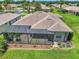 A generous screened lanai is perfect for enjoying the outdoors, complemented by meticulous landscaping and serene backyard at 1443 Sw 161St St, Ocala, FL 34473