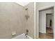 Tiled shower with built-in shelves and modern fixtures at 1443 Sw 161St St, Ocala, FL 34473
