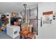 Utility area with shelving, appliances, and essential home systems at 1443 Sw 161St St, Ocala, FL 34473
