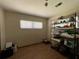 Bedroom or flex space featuring wood floors and wire shelving at 1523 Se 80Th St, Ocala, FL 34480