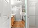 Well-lit bathroom features tile floors, single vanity, walk in shower, and closet at 1751 Brandenburg Ct, The Villages, FL 32163
