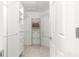 Spacious walk-in closet with built-in shelving for optimal organization at 1751 Brandenburg Ct, The Villages, FL 32163