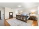 A bedroom featuring a decorative rug, hardwood floors, and two end tables at 1922 Se 13Th St, Ocala, FL 34471