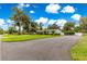 Spacious lot with a home featuring mature trees and plenty of parking space at 1922 Se 13Th St, Ocala, FL 34471