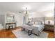 Main bedroom with hardwood floors, neutral colors, and a relaxing atmosphere at 1922 Se 13Th St, Ocala, FL 34471