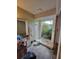 Bright bathroom featuring a garden view shower and lots of natural light at 20045 Sw 88Th Place Rd, Dunnellon, FL 34431