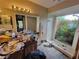 Bathroom featuring a garden view shower and spacious vanity with an illuminated mirror at 20045 Sw 88Th Place Rd, Dunnellon, FL 34431
