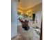 Bathroom with spacious double vanity, illuminated mirrors, and a garden view shower at 20045 Sw 88Th Place Rd, Dunnellon, FL 34431