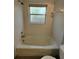 Bathroom tub with window for natural light at 20045 Sw 88Th Place Rd, Dunnellon, FL 34431