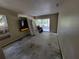 Bedroom featuring a sliding glass door and modern wall-mounted air conditioner at 20045 Sw 88Th Place Rd, Dunnellon, FL 34431
