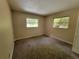 Bedroom with two windows providing lots of natural light at 20045 Sw 88Th Place Rd, Dunnellon, FL 34431