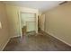 Bedroom featuring a closet and door at 20045 Sw 88Th Place Rd, Dunnellon, FL 34431