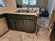 Kitchen sink featuring stainless steel hardware, and laminate countertops at 20045 Sw 88Th Place Rd, Dunnellon, FL 34431