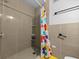 Bathroom showcasing a tile shower with neutral colors at 2340 Ne 14Th Ave, Ocala, FL 34470