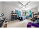 Bedroom with neutral walls, ceiling fan, and a bed at 2340 Ne 14Th Ave, Ocala, FL 34470