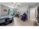 Bedroom with neutral walls, ceiling fan, and a bed at 2340 Ne 14Th Ave, Ocala, FL 34470