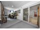 Bonus room with a sliding glass door and gray painted floor at 2340 Ne 14Th Ave, Ocala, FL 34470