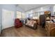 Bedroom seating area with hardwood floors, natural light, a cozy seating area, and ample storage at 2340 Ne 14Th Ave, Ocala, FL 34470