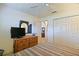 Bedroom with dresser, closet and access to other rooms at 3146 Williams Rd, The Villages, FL 32162