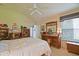 Bright bedroom with plush carpeting, ample storage, and a charming reading nook at 3146 Williams Rd, The Villages, FL 32162