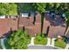 Aerial view of townhomes with screened-in lanai and community landscaping and easy access at 3707 Ne 17Th St, Ocala, FL 34470