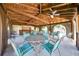 Poolside lounge area offering shaded seating for relaxing by the community pool at 3707 Ne 17Th St, Ocala, FL 34470