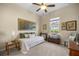 Guest bedroom featuring a daybed, large window, and cozy decor at 3948 Se 4Th Ter, Ocala, FL 34480