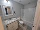 Bright bathroom with granite counters, white cabinets, and shower/tub combo at 5185 Sw 158Th Pl, Ocala, FL 34473