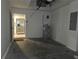 Garage interior with water heater and access to kitchen at 5185 Sw 158Th Pl, Ocala, FL 34473