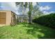 The backyard is private with plenty of room to play. It also features an enclosed screened lanai at 5347 Pecan Rd, Ocala, FL 34472