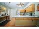 Well-equipped kitchen with stainless steel appliances, ample cabinet space, and an adjacent breakfast nook at 5347 Pecan Rd, Ocala, FL 34472