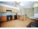 Modern kitchen with stainless steel appliances and ample counter space for cooking at 5347 Pecan Rd, Ocala, FL 34472