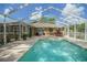 Enjoy the Florida lifestyle with a screened-in pool, outdoor kitchen, and plenty of space for entertaining at 5347 Pecan Rd, Ocala, FL 34472