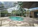Enjoy the Florida sunshine by your own screened-in pool, perfect for relaxation and entertainment at 5347 Pecan Rd, Ocala, FL 34472