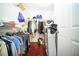 Large walk-in closet with shelving and clothing racks for storage and organization at 5347 Pecan Rd, Ocala, FL 34472