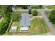 Aerial view of the property highlighting a large fenced backyard with storage shed at 5500 Se 2Nd Pl, Ocala, FL 34480