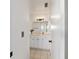 Bathroom view featuring a vanity with marble countertops and modern lighting at 5500 Se 2Nd Pl, Ocala, FL 34480