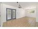 Dining room with tile floors, chandelier and backyard access at 5500 Se 2Nd Pl, Ocala, FL 34480